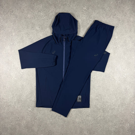 ASICS WATERPROOF ELASTIC WOVEN TRACKSUIT NAVY